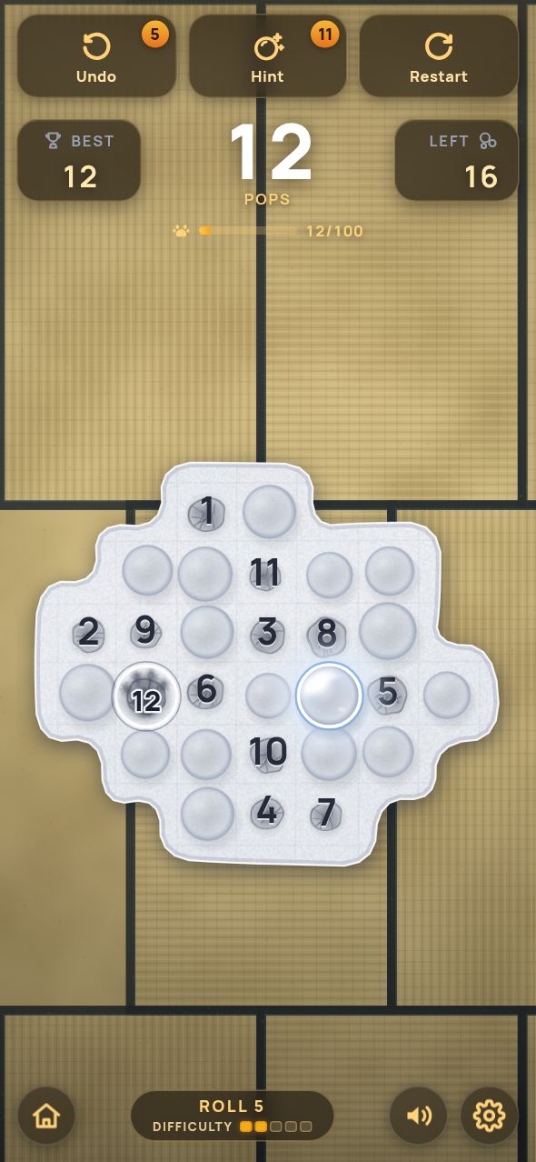 A PopSkip roll in play: an irregular sheet of bubble wrap with twelve popped bubbles numbered in the order they were popped, a pops counter of 12, 16 bubbles left, and Undo, Hint and Restart buttons.